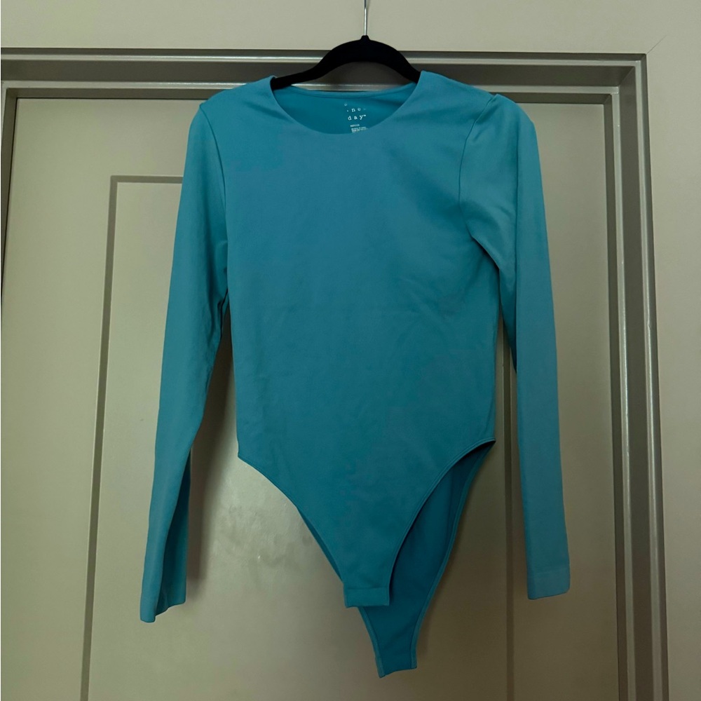 A new day blue long sleeve body suit